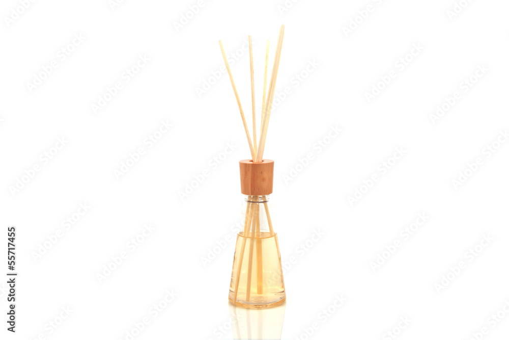 Wooden aroma spa sticks in bottle, isolated on white Wooden aroma spa sticks in bottle, isolated on white