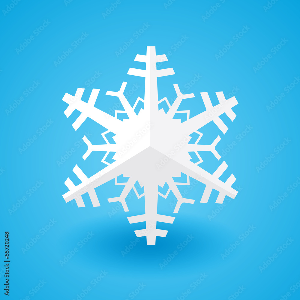 White paper christmas snowflake on a blue background with shadow White paper christmas snowflake on a blue background with shadow