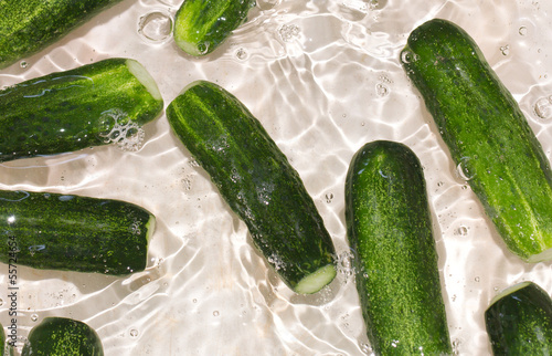 cucumbers in the water as a background photo