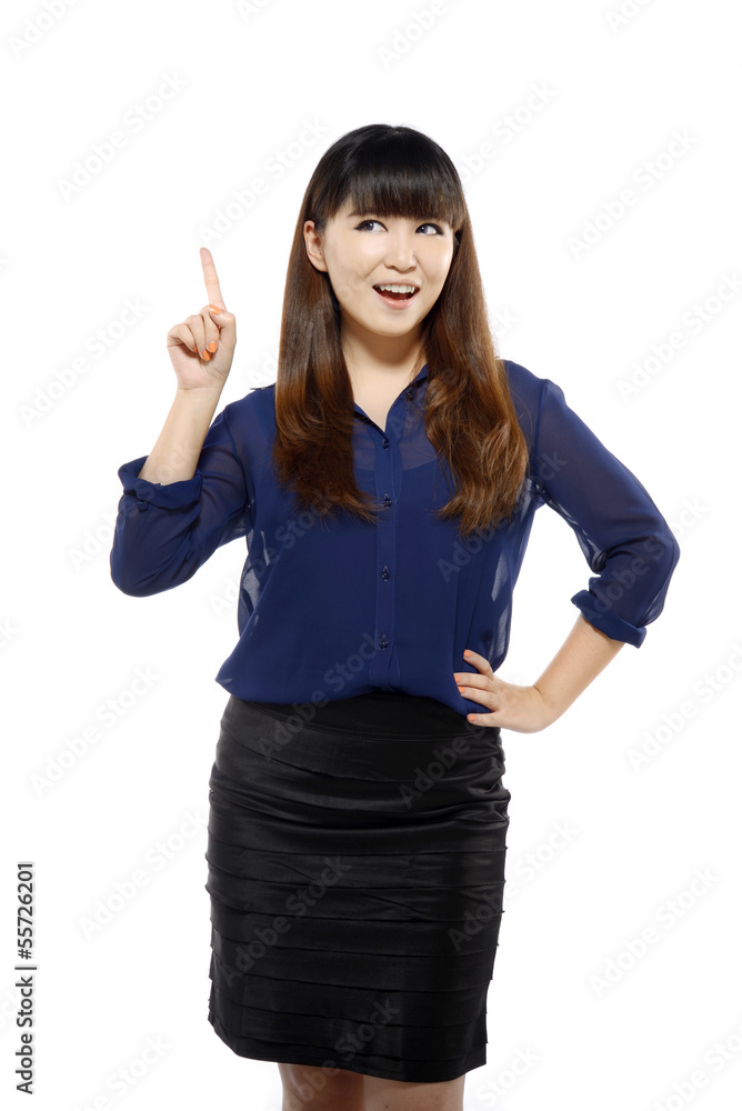 Successful young business asian woman pointing somewhere Successful young business asian woman pointing somewhere