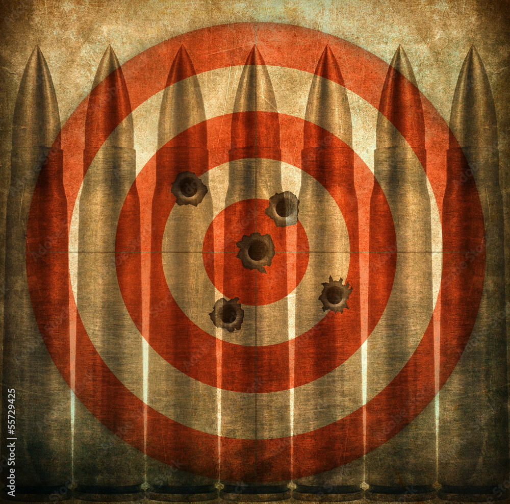 Target with bullet holes Target with bullet holes