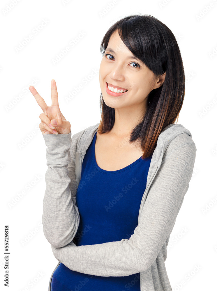 young girl show victory sign isolated on white background young girl show victory sign isolated on white background