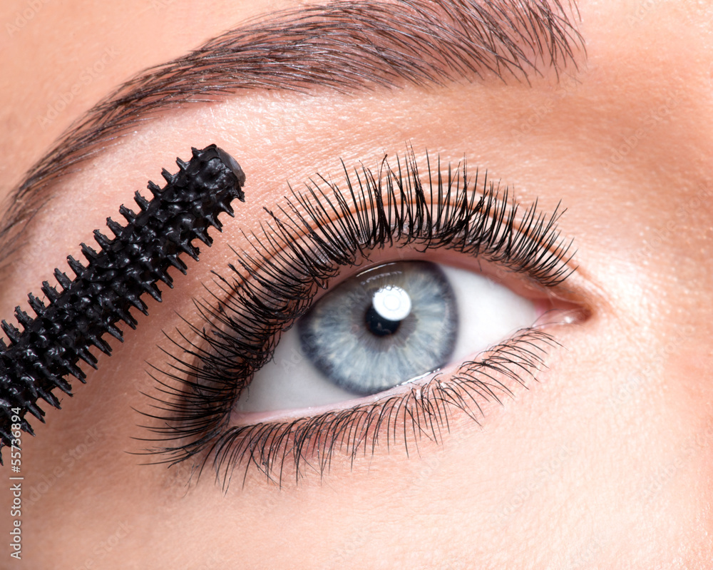 Fototapeta premium Beauty female eye with long false eyelashes