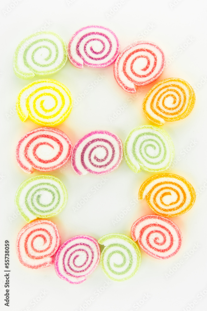 Letter B written with slices of dried sweet candies Letter B written with slices of dried sweet candies