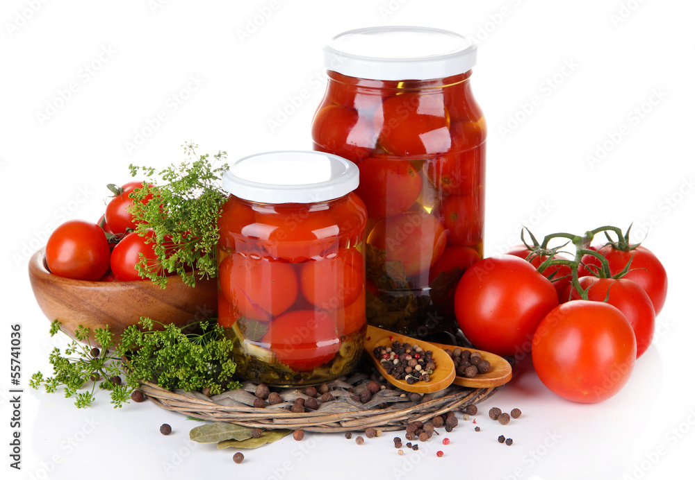 Tasty canned and fresh tomatoes, isolated on white Tasty canned and fresh tomatoes, isolated on white