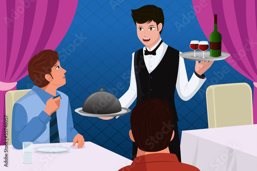 Waiter in a restaurant serving customers