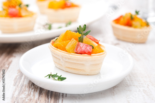 tartlet with roasted vegetables on a plate