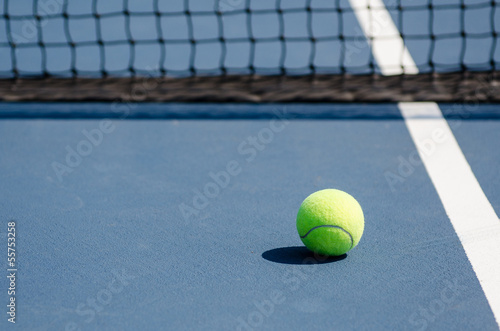 Tennis Ball on Court with Net © sharpshutter22