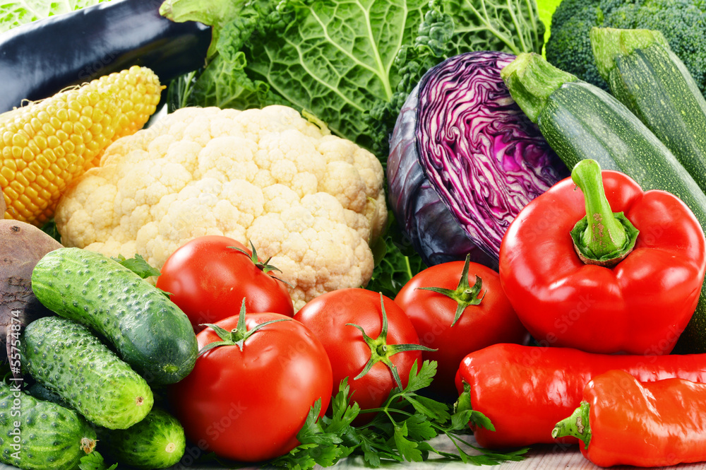 Composition with variety of fresh raw organic vegetables Composition with variety of fresh raw organic vegetables