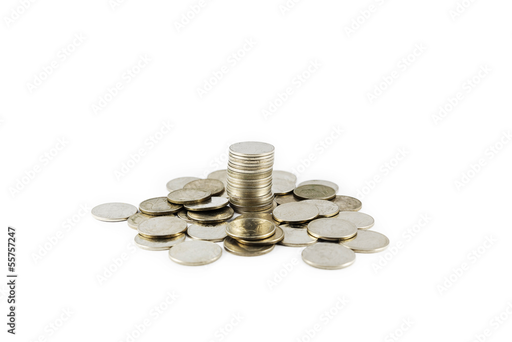 Coin stack surround by coins Coin stack surround by coins