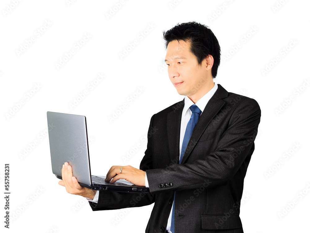 Asian business man with a laptop computer over white Asian business man with a laptop computer over white