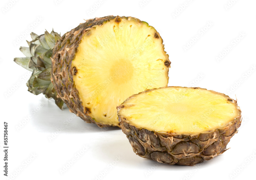 Juicy pineapple with slices isolated on white background