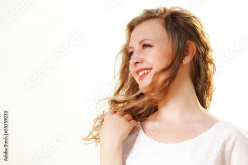 young woman wind in hair outdoor