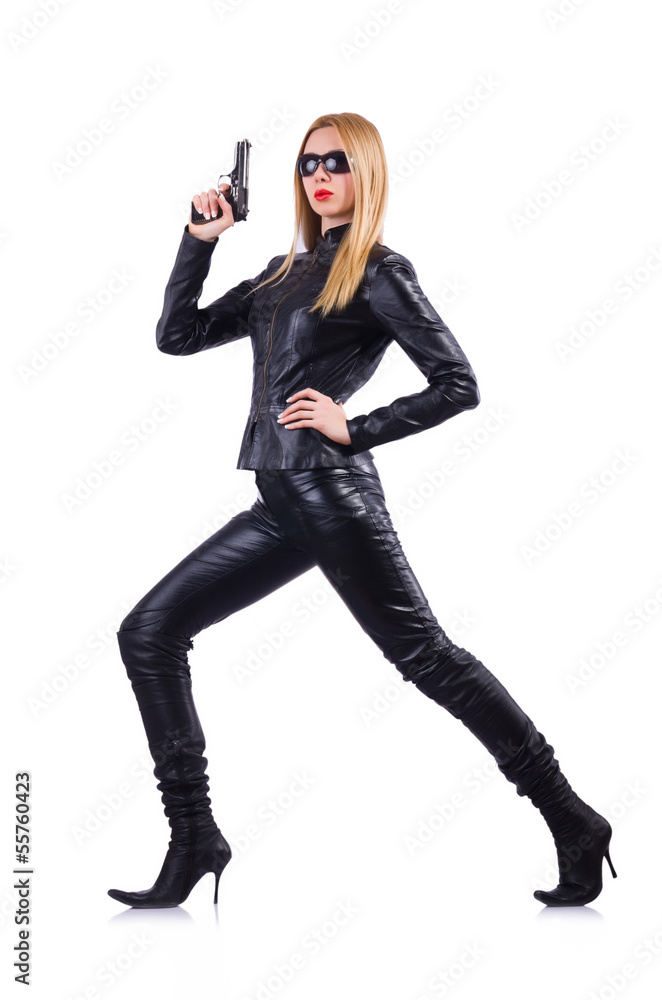 Woman with gun in black leather costume