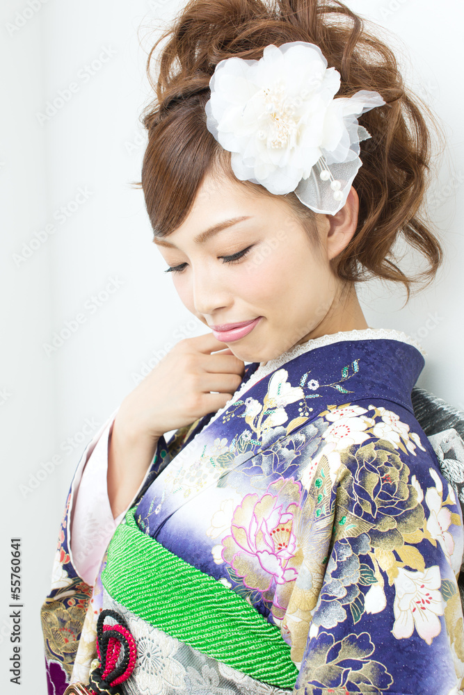 Beautiful asian kimono woman on white background Beautiful asian kimono woman on white background