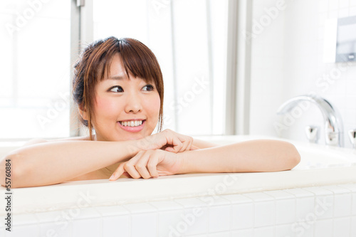 beautiful asian woman relaxing in the bath room