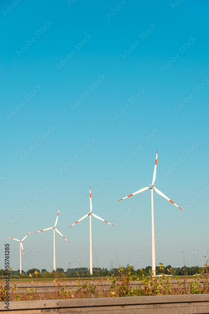 Wind mills during bright summer day Wind mills during bright summer day