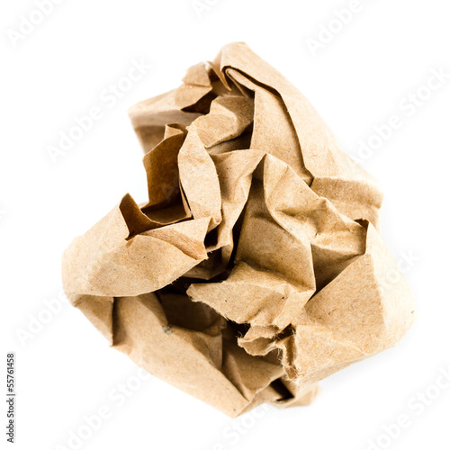 Crumpled recycled paper ball isolated on white background closeu