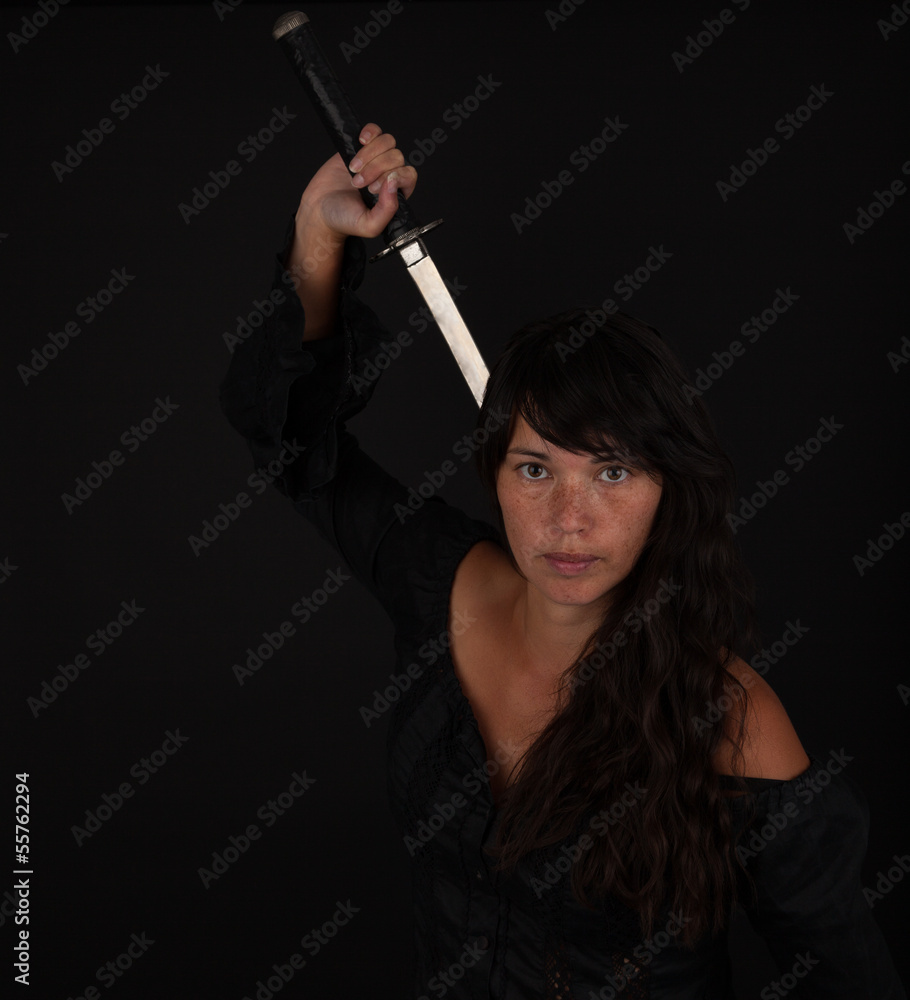 Obraz premium Asian woman grabbing her sword