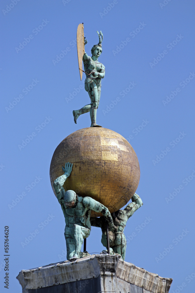 Fototapeta premium gold ball over the monument at Punta della dogana in Venice deta