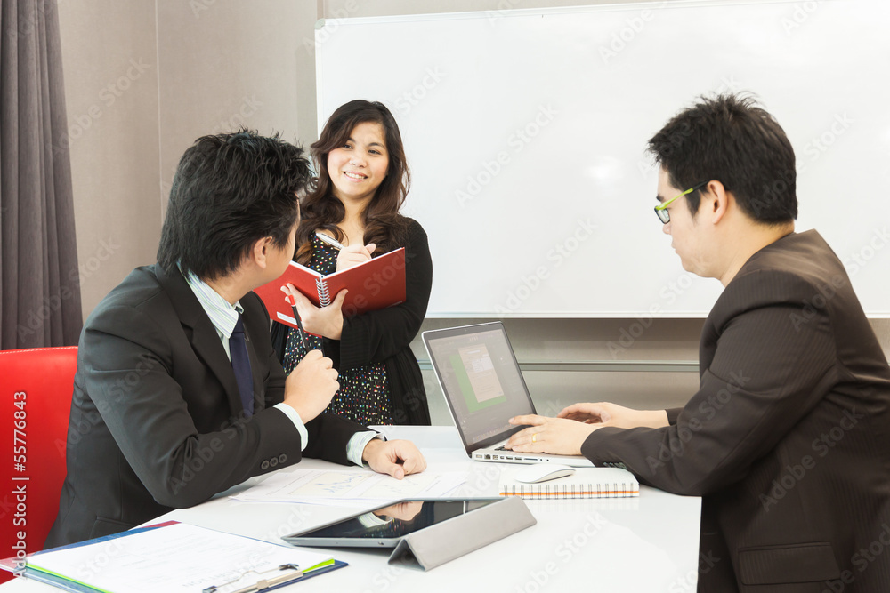 Young business people are working in the meeting room. Young business people are working in the meeting room.