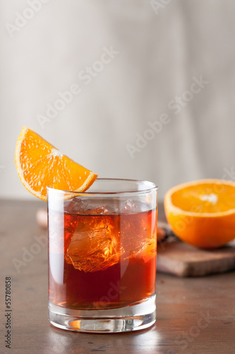 Obraz na plátně Classic negroni cocktail on wooden table
