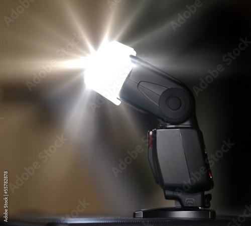 Camera flash or speedlite firing.