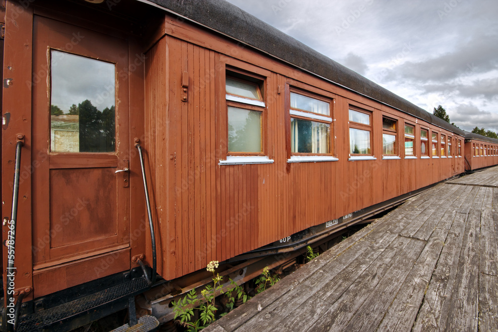 Old railway station and wooden train car