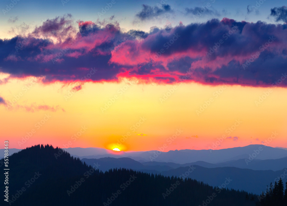 Silhouette of the mountains in the backdrop of the sunset