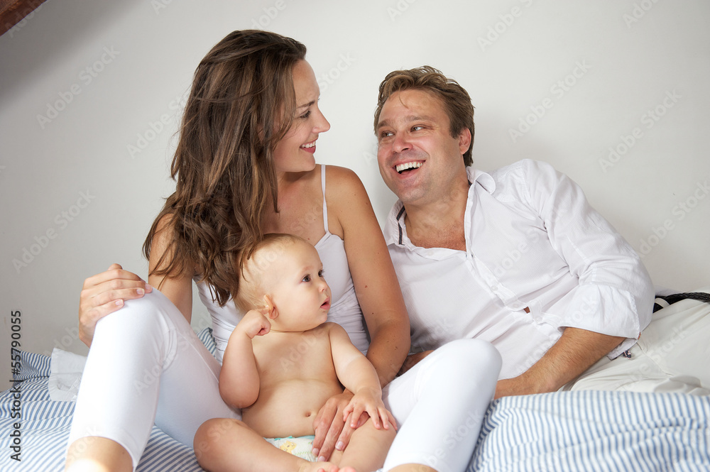 Portrait of a happy family smiling together at home Portrait of a happy family smiling together at home