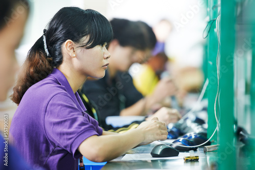 Photography female chinese worker in factory