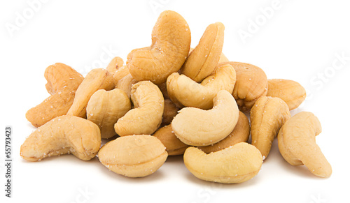 Heap of cashew nuts isolated on white background photo