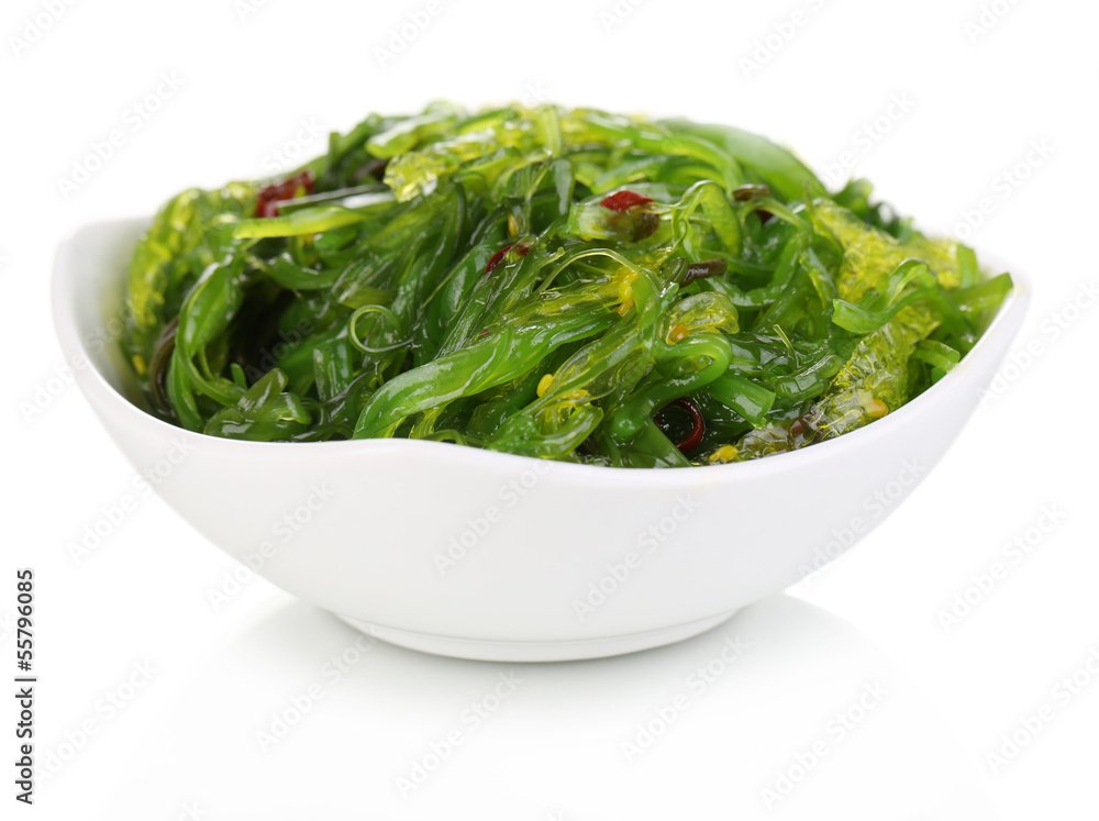 Sea kale in bowl close-up isolated on white Sea kale in bowl close-up isolated on white