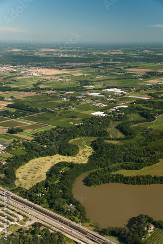 Aerial view of waterway  agriculture and highway