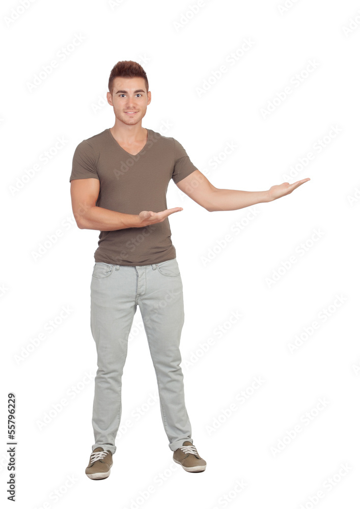 Young smiling man shows something Young smiling man shows something