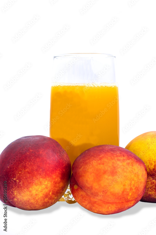 Peach fruit juice in glass isolated Peach fruit juice in glass isolated