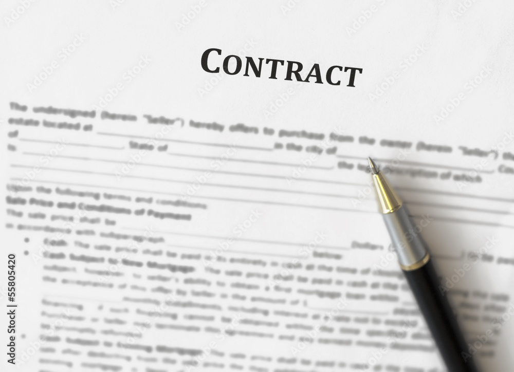 Obraz premium document with signature and pen