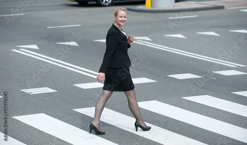 Portrait of a businesswoman walking in the city