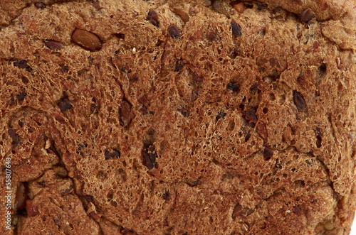 background texture of a porous brown bread