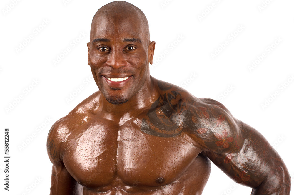Confident black bodybuilder smiling.Strong man Confident black bodybuilder smiling.Strong man