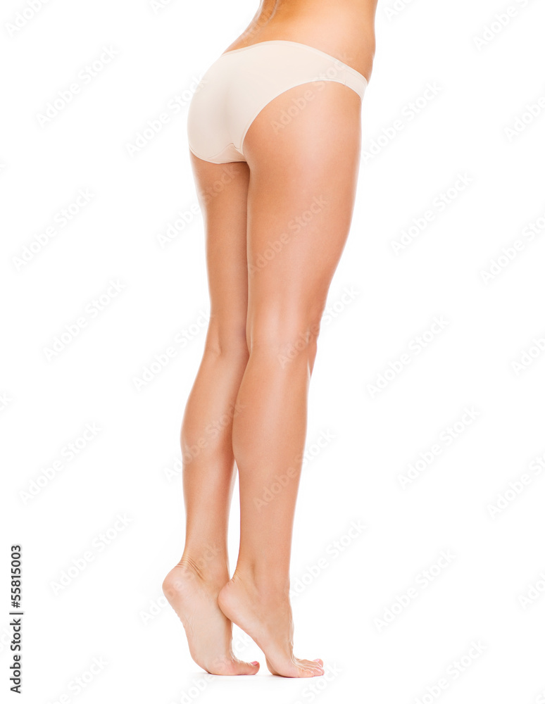 woman with long legs in cotton underwear woman with long legs in cotton underwear