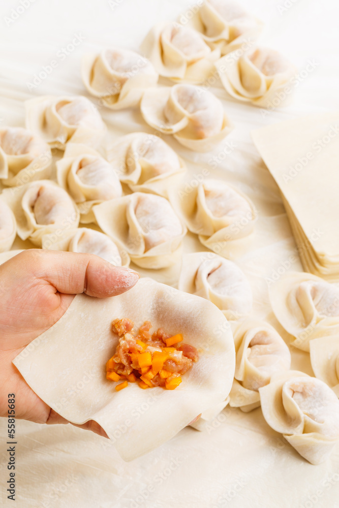 Wrapping of Chinese dumpling Wrapping of Chinese dumpling