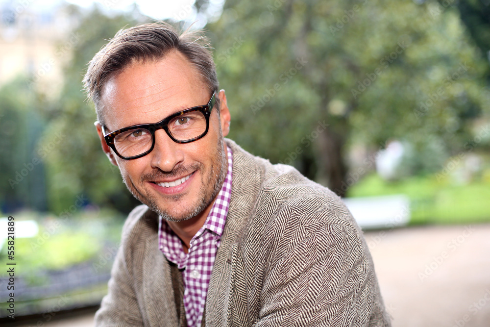 Trendy handsome man with eyeglasses in the street Trendy handsome man with eyeglasses in the street