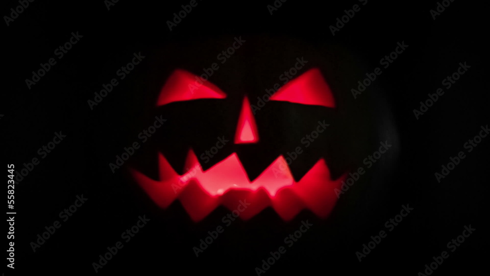 Scary halloween pumpkin jack-o-lantern candle lit Scary halloween pumpkin jack-o-lantern candle lit