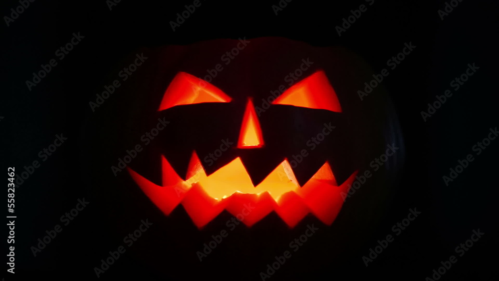 Scary halloween pumpkin jack-o-lantern candle lit Scary halloween pumpkin jack-o-lantern candle lit