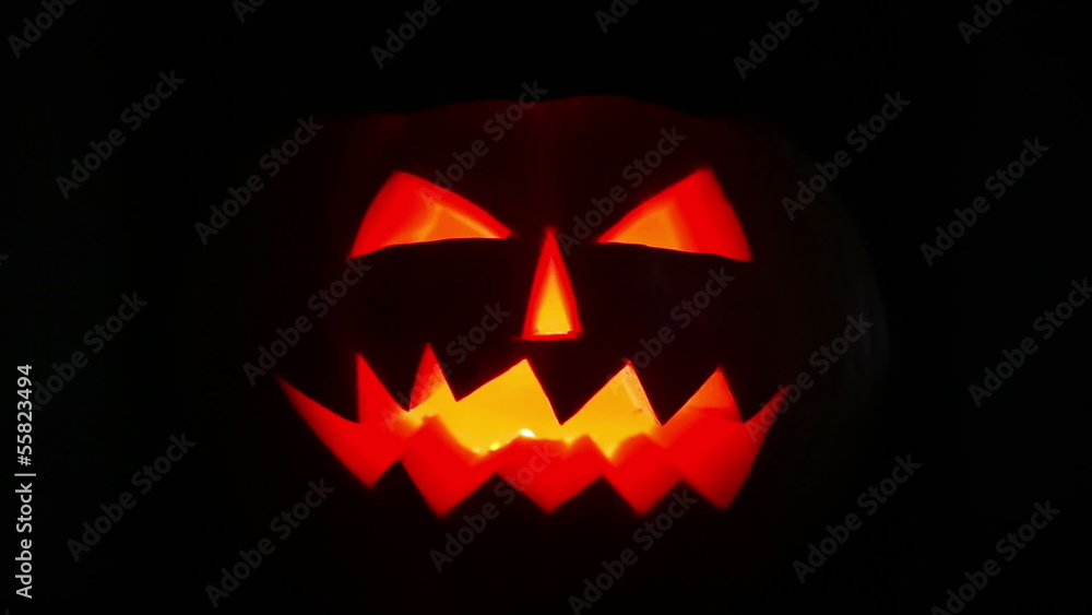Scary halloween pumpkin jack-o-lantern candle lit Scary halloween pumpkin jack-o-lantern candle lit