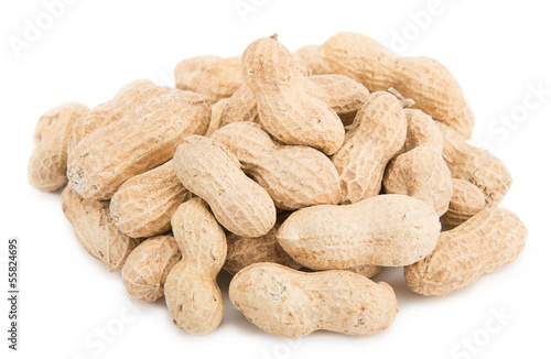 Heap of dried peanut isolated on white background