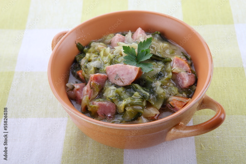Traditional polish sauerkraut (bigos) with sausages