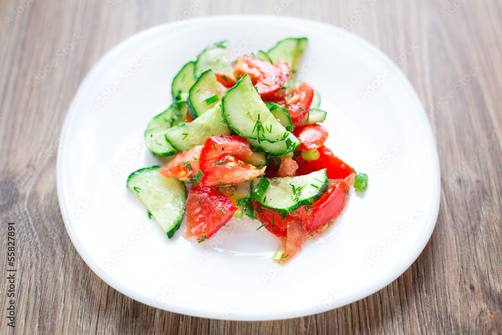 Tomato salad with cucumber and onion