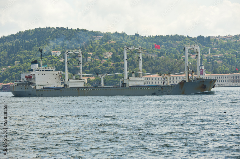 Large ship traveling on a river Large ship traveling on a river